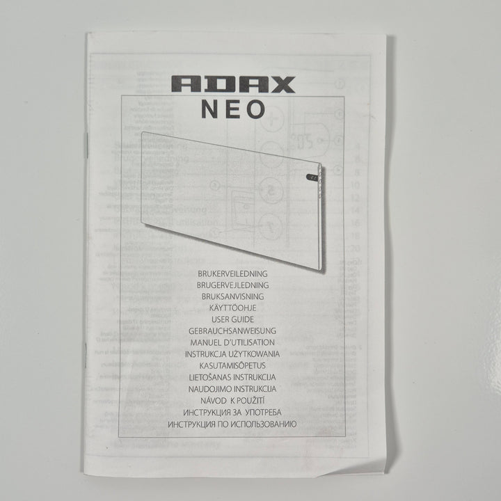 ADAX Neo vit väggmonterad elradiator begagnad