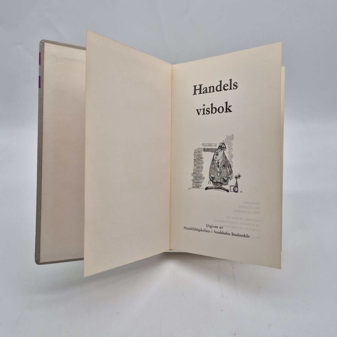 Retro visbok Handelshögskolan lila textilpärm