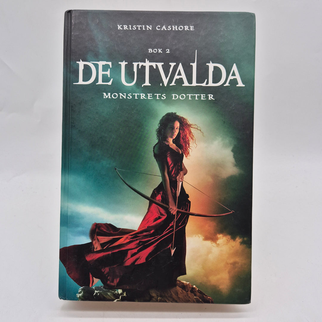 De utvalda Monstrets dotter fantasybok hårdband