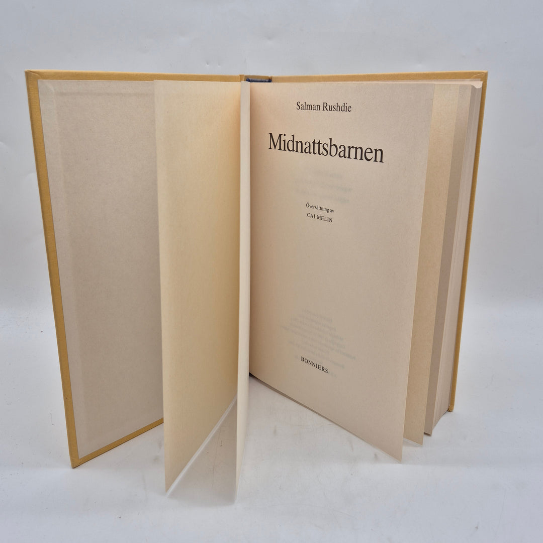 Midnattsbarnen Salman Rushdie gul inbunden Bonniers