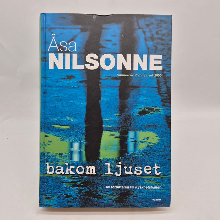 Bakom ljuset kriminalroman inbunden Åsa Nilsonne