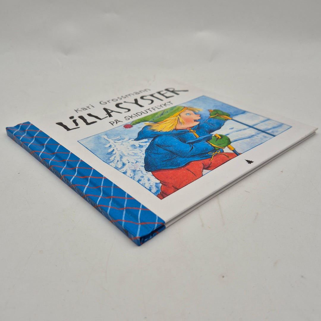 Lillasyster på skidutflykt barnbok Gyldendal