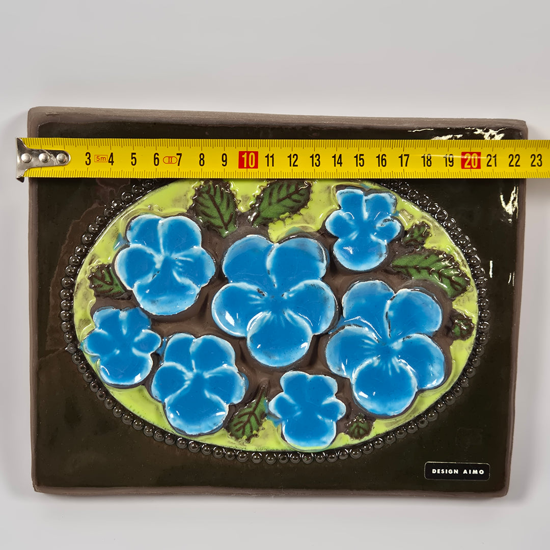 Retro keramikväggplatta blå blommor Design Aimo