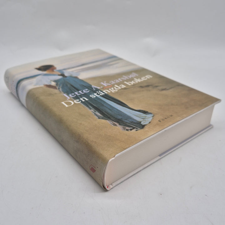 Den stängda boken inbunden roman historisk