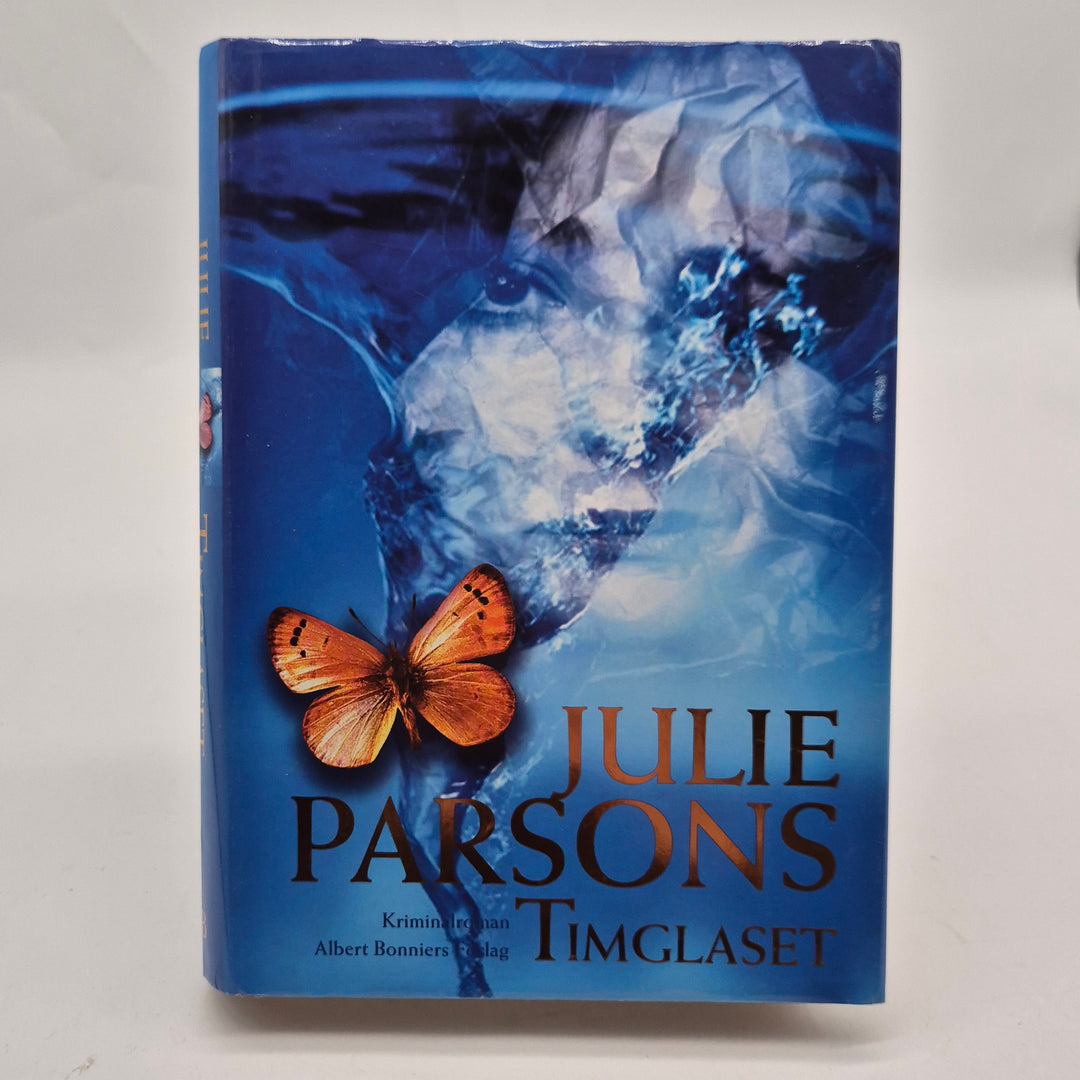 Timglaset kriminalroman inbunden blå Julie Parsons
