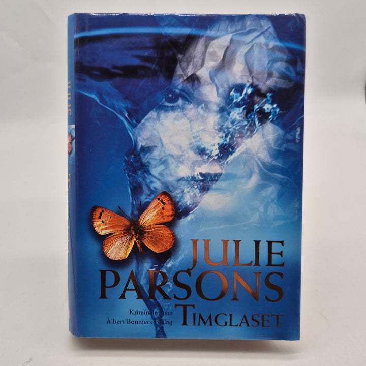 Timglaset kriminalroman inbunden blå Julie Parsons