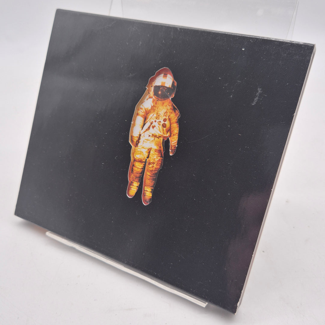 Alternativ rock CD med astronautmotiv svart