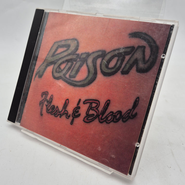 Poison Flesh & Blood retro rock-CD begagnad