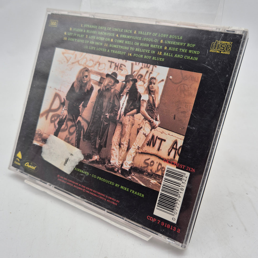 Poison Flesh & Blood retro rock-CD begagnad