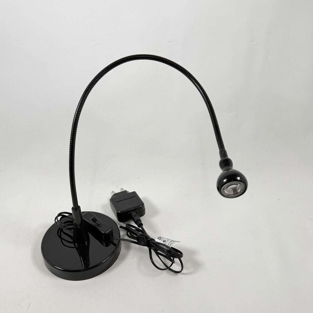Elegant och justerbar bordslampa i svart metall
