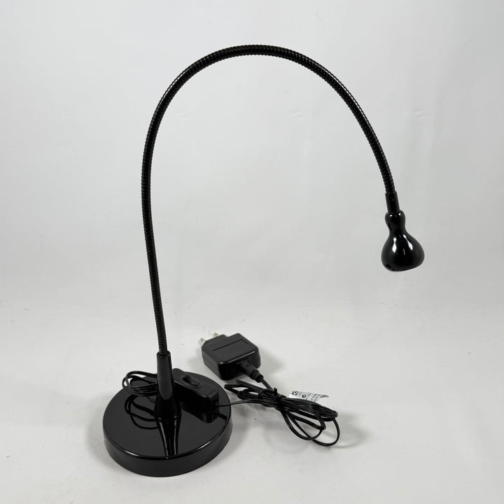 Elegant och justerbar bordslampa i svart metall