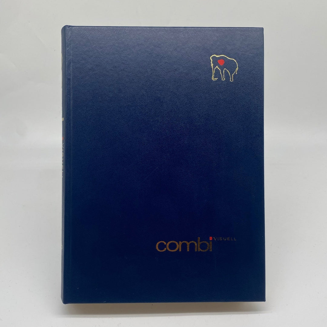 Mörkblå Bok med Gulddekorationer - Combi Visuell - Homy Secondhand Online