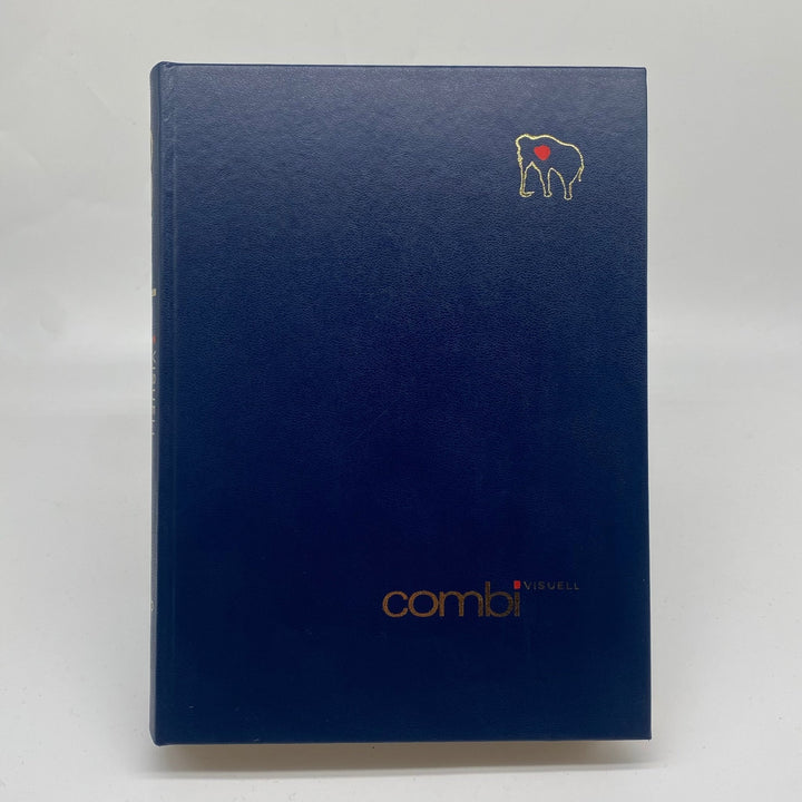 Mörkblå Bok med Gulddekorationer - Combi Visuell - Homy Secondhand Online