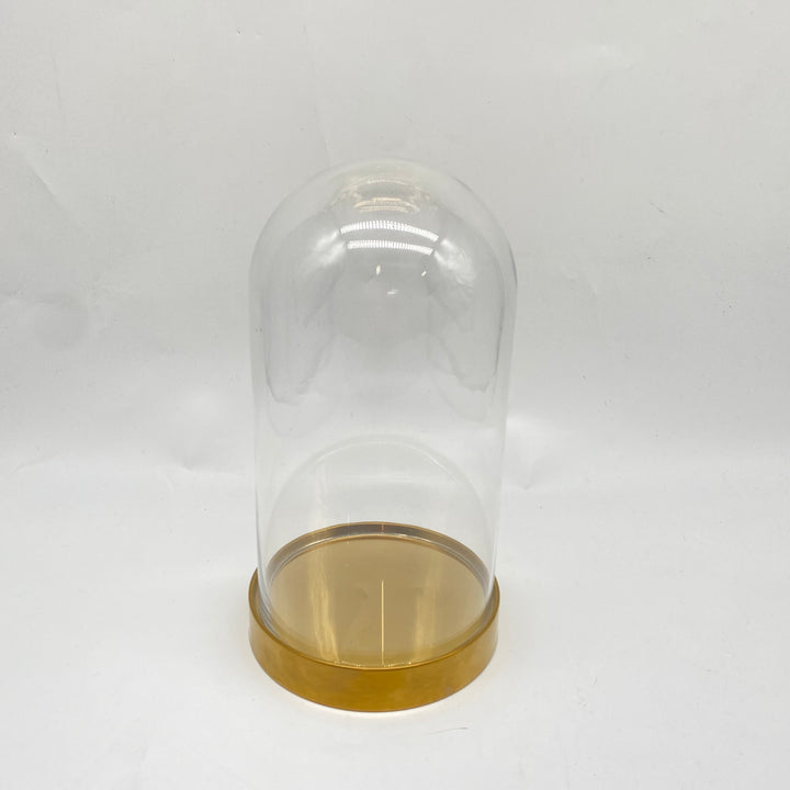 IKEA glaskupol med stilren design och gyllene bas