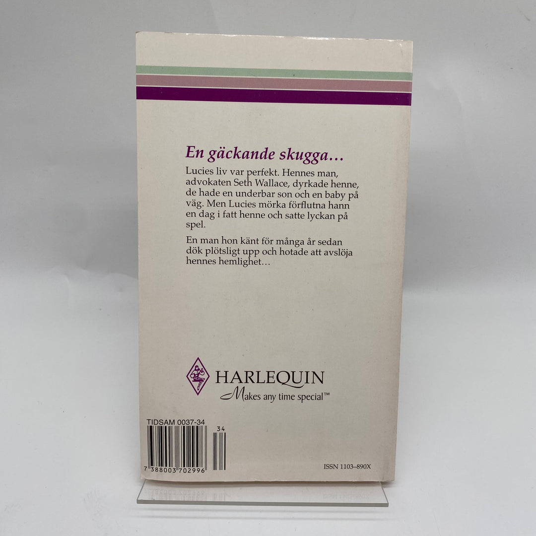Harlequin retro roman Misstänkt hustru