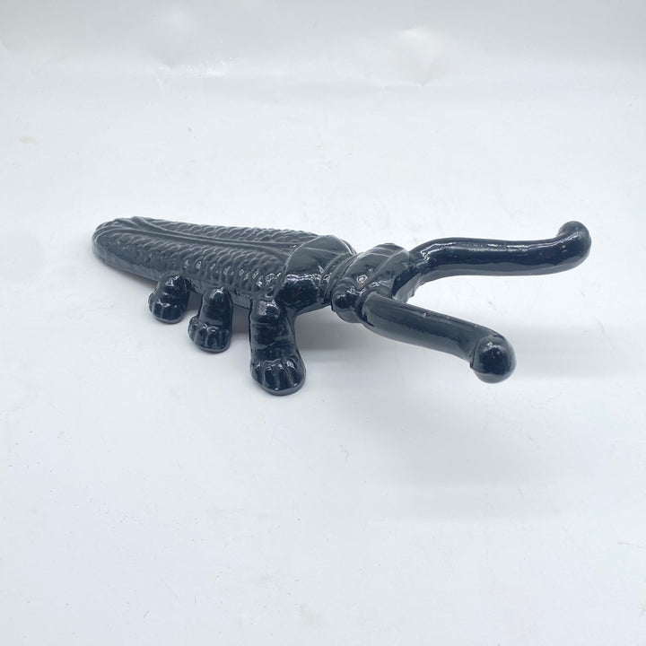 Svart metal krokodil, unik inredningsdetalj