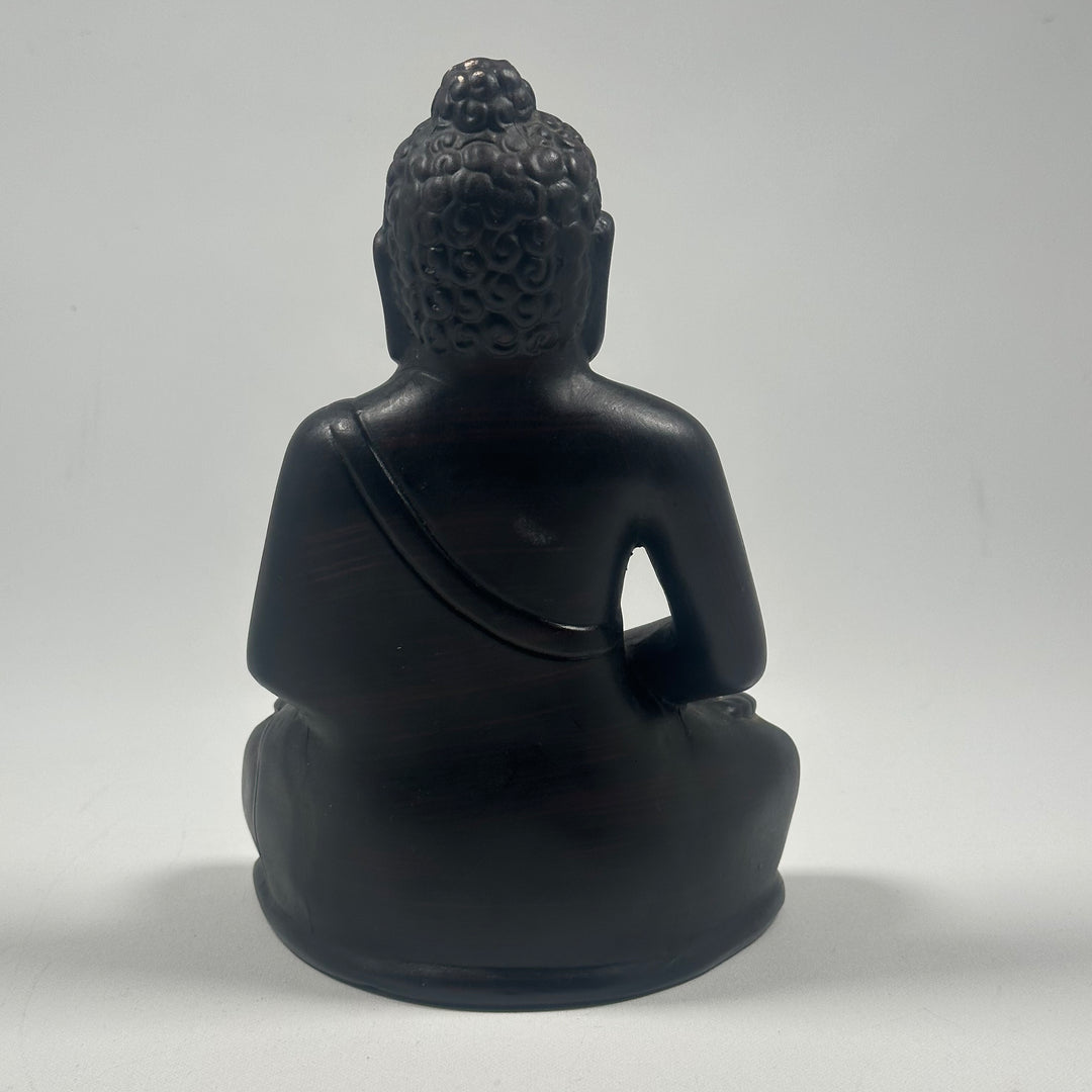 Sittande Buddhastaty i Svart Harts
