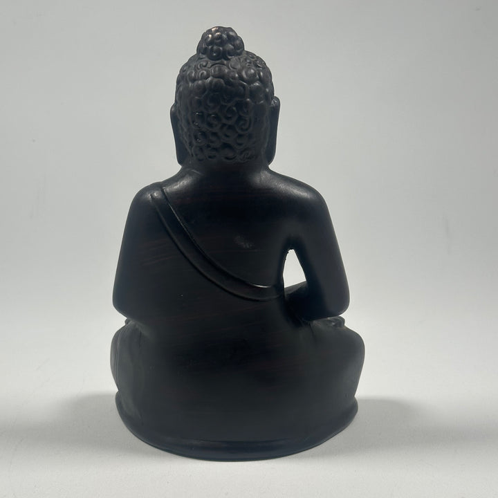 Sittande Buddhastaty i Svart Harts