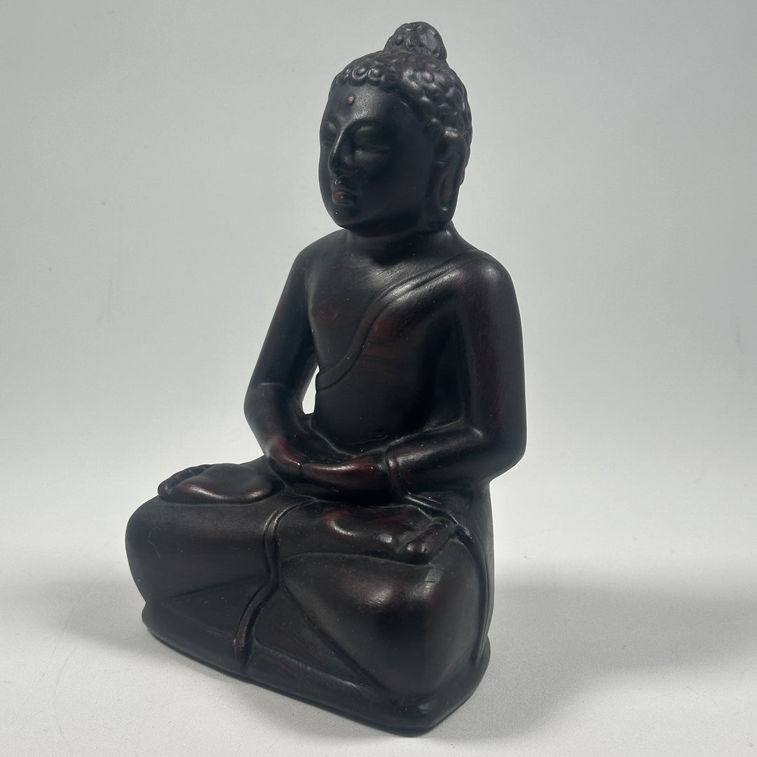 Sittande Buddhastaty i Svart Harts
