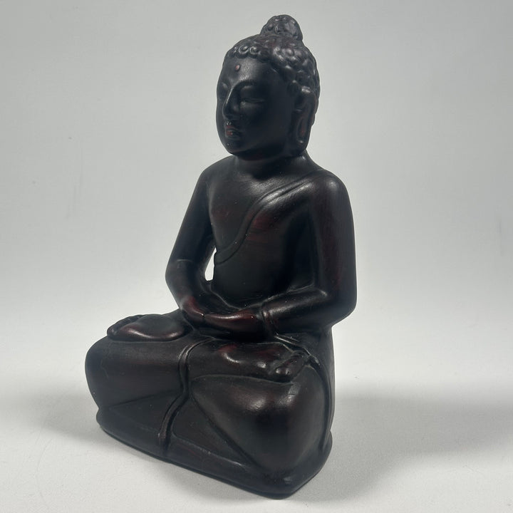 Sittande Buddhastaty i Svart Harts