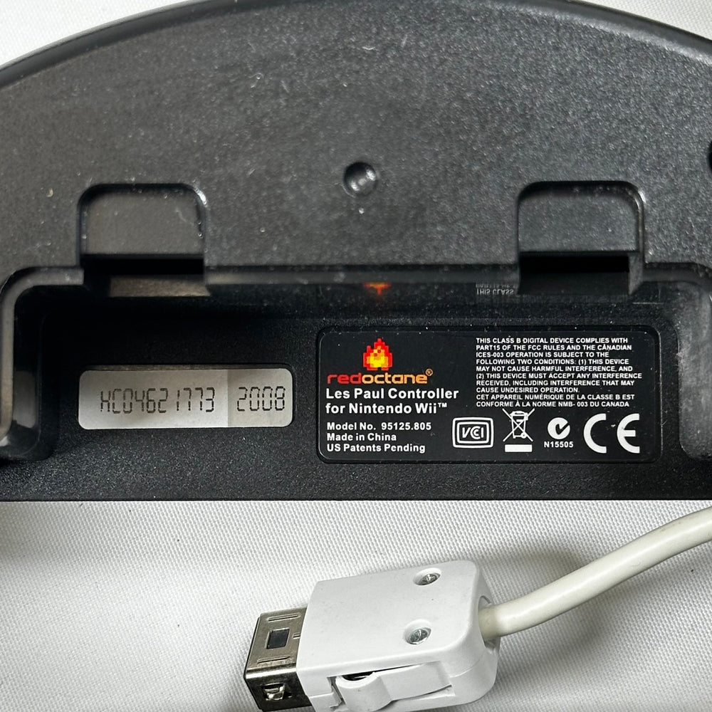 Retro gitarrformad spelkontroll med dekaler - Homy Secondhand Online