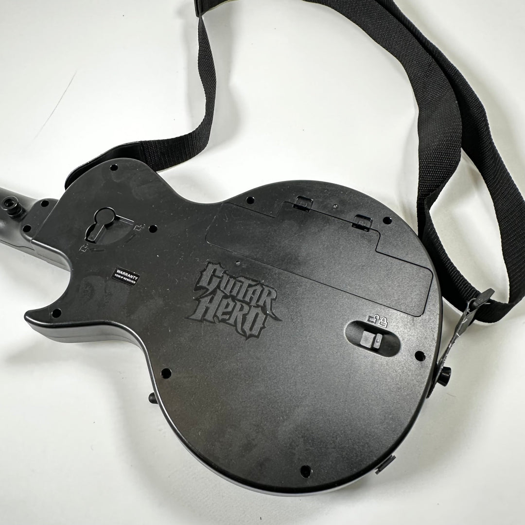 Retro gitarrformad spelkontroll med dekaler - Homy Secondhand Online