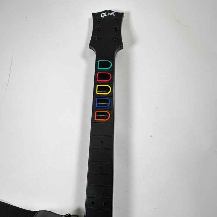Retro gitarrformad spelkontroll med dekaler - Homy Secondhand Online