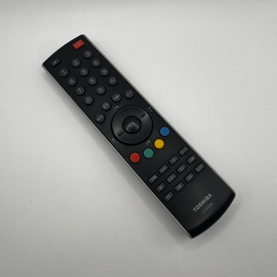 Svart Toshiba fjärrkontroll med färgknappar - Homy Secondhand Online