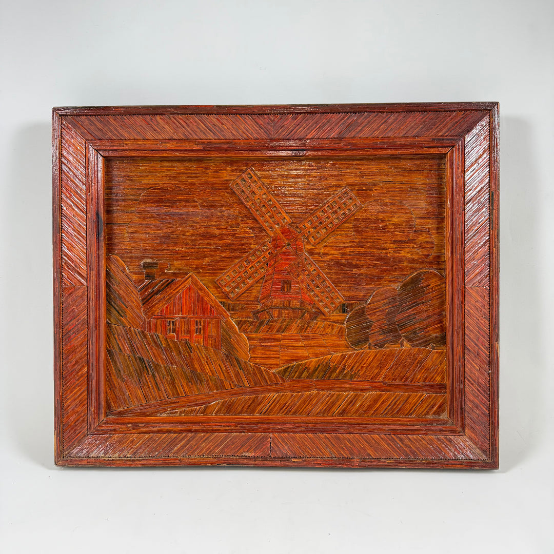 Retro trärelief med väderkvarn och byggnader