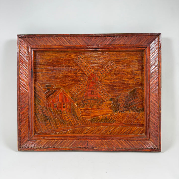 Retro trärelief med väderkvarn och byggnader