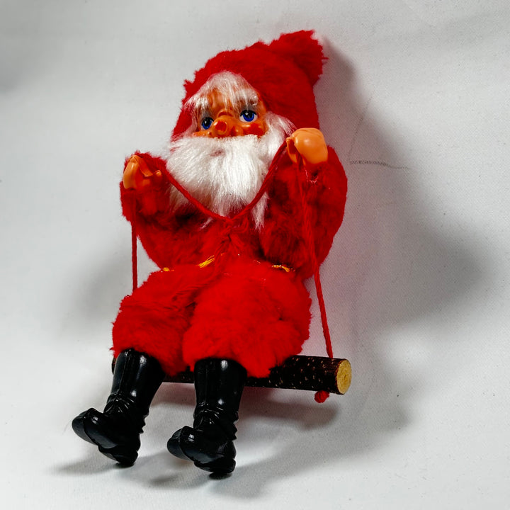 Röd juldekoration Tomte på gunga