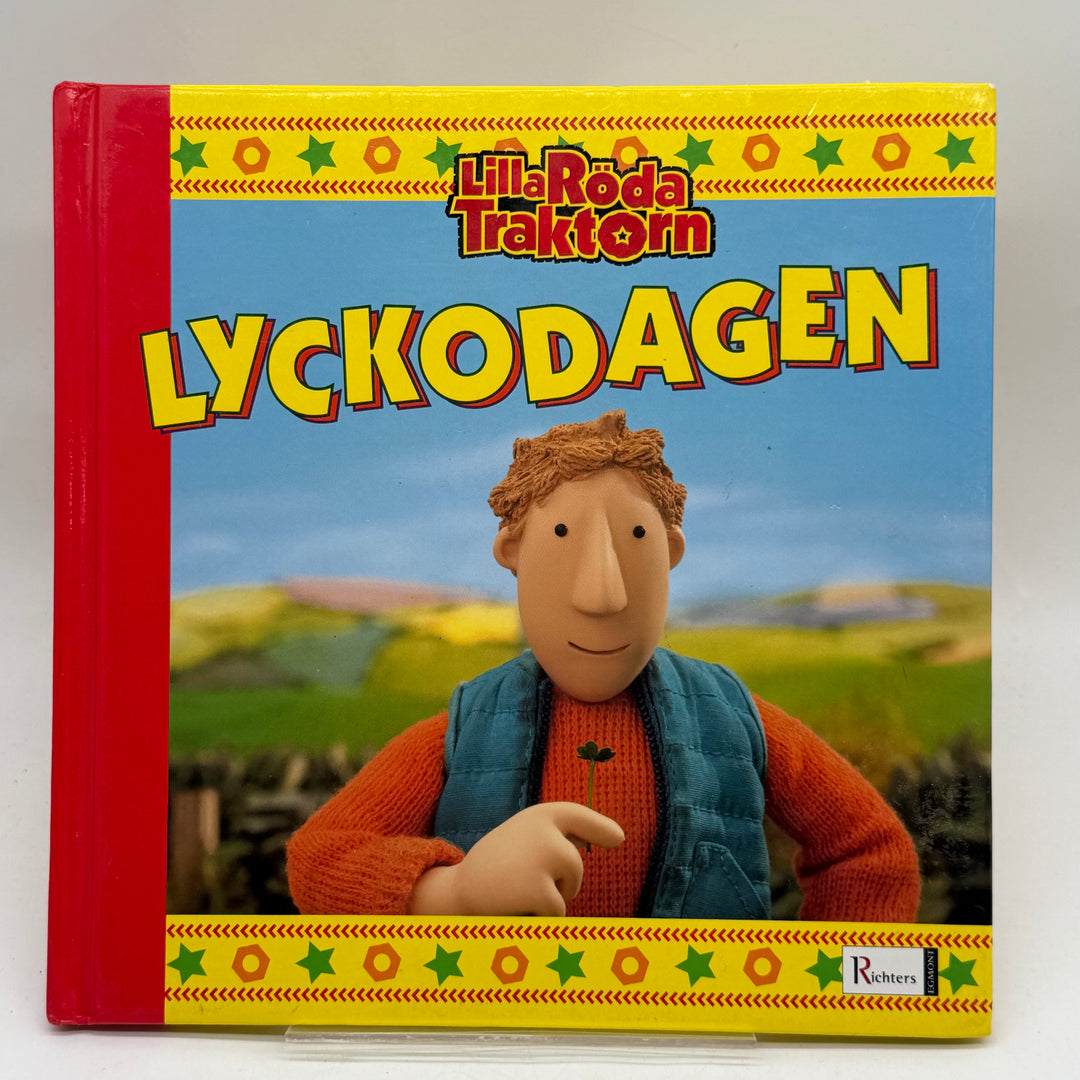 Lilla Röda Traktorn Lyckodagen bilderbok begagnad