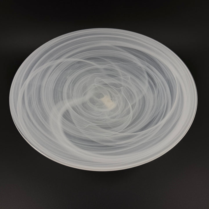 Elegant vit dekorativ tallriken i glas