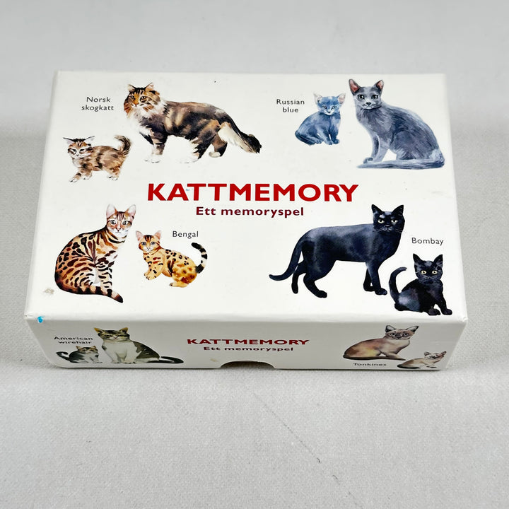 Kattmemory-spel med illustrerade rasmotiv