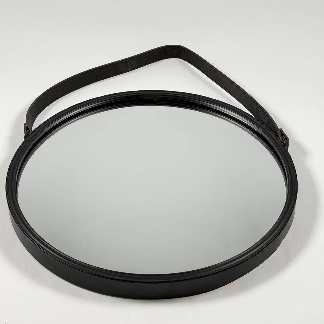 Rund retro spegel med svart ram och läderband