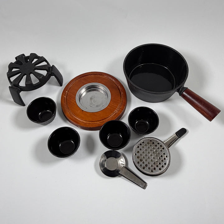 Retro ostfondueset i gjutjärn från Boska