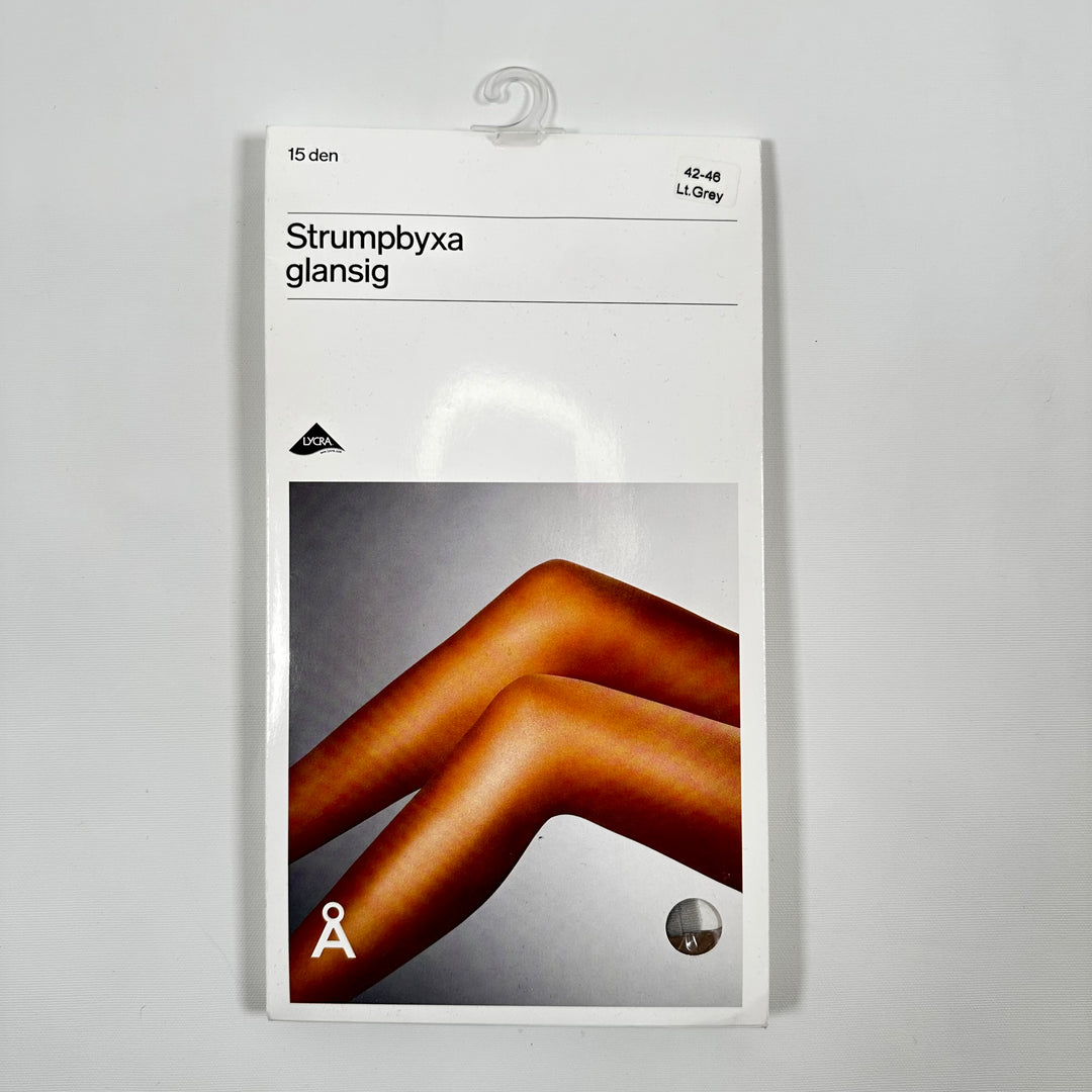 Eleganta glansiga ljusgrå strumpbyxor från Åhléns