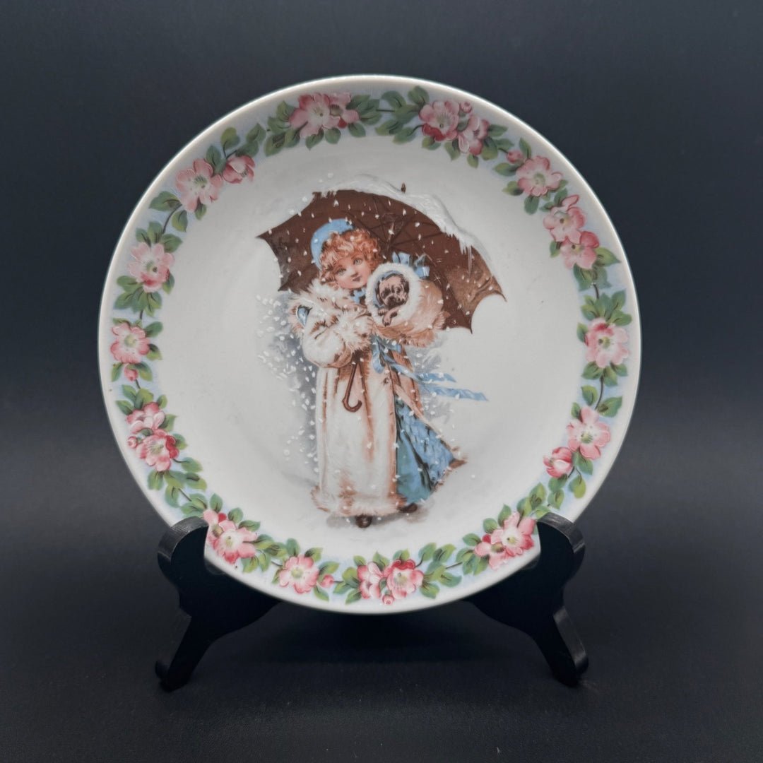 Vintage prydnadstallrik med ängelmotiv och blommor - Homy Secondhand Online