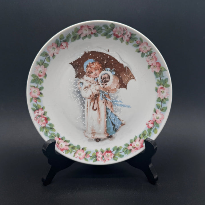 Vintage prydnadstallrik med ängelmotiv och blommor - Homy Secondhand Online