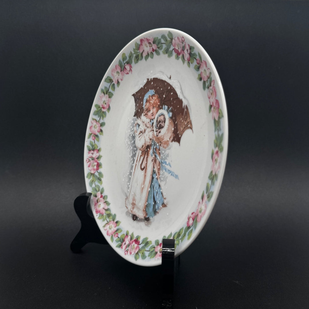 Vintage prydnadstallrik med ängelmotiv och blommor - Homy Secondhand Online