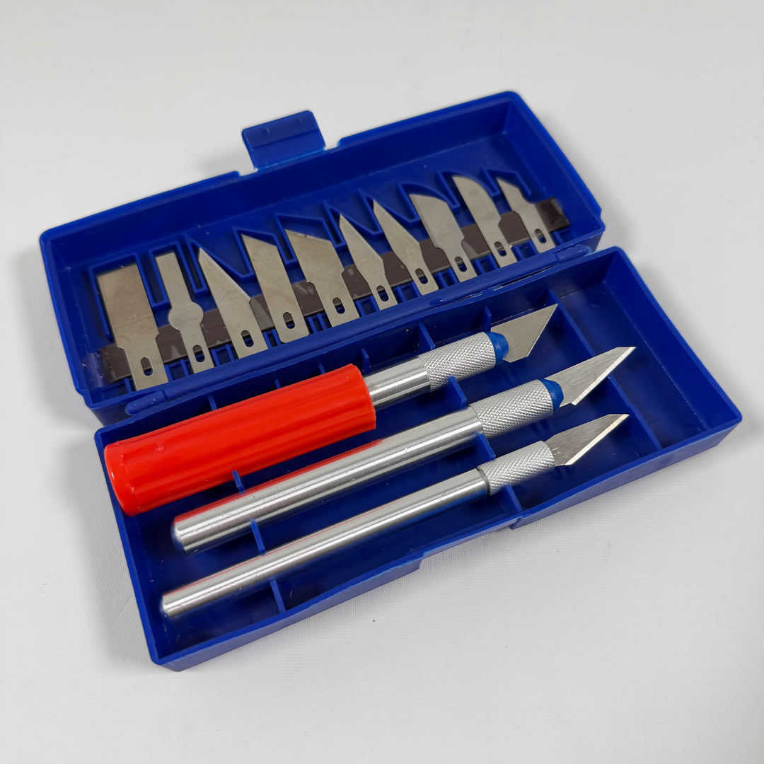 Precisionsskalpellset med blå förvaringsask