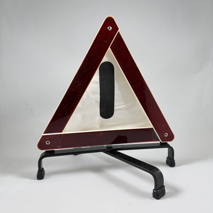 Retro röd reflextriangel i plast och metall