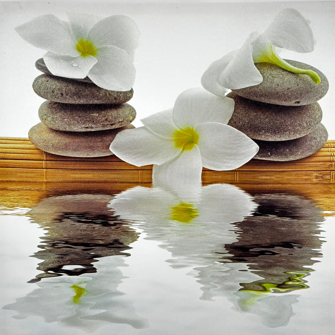 Zeninspirerad canvastavla med blommor och stenar