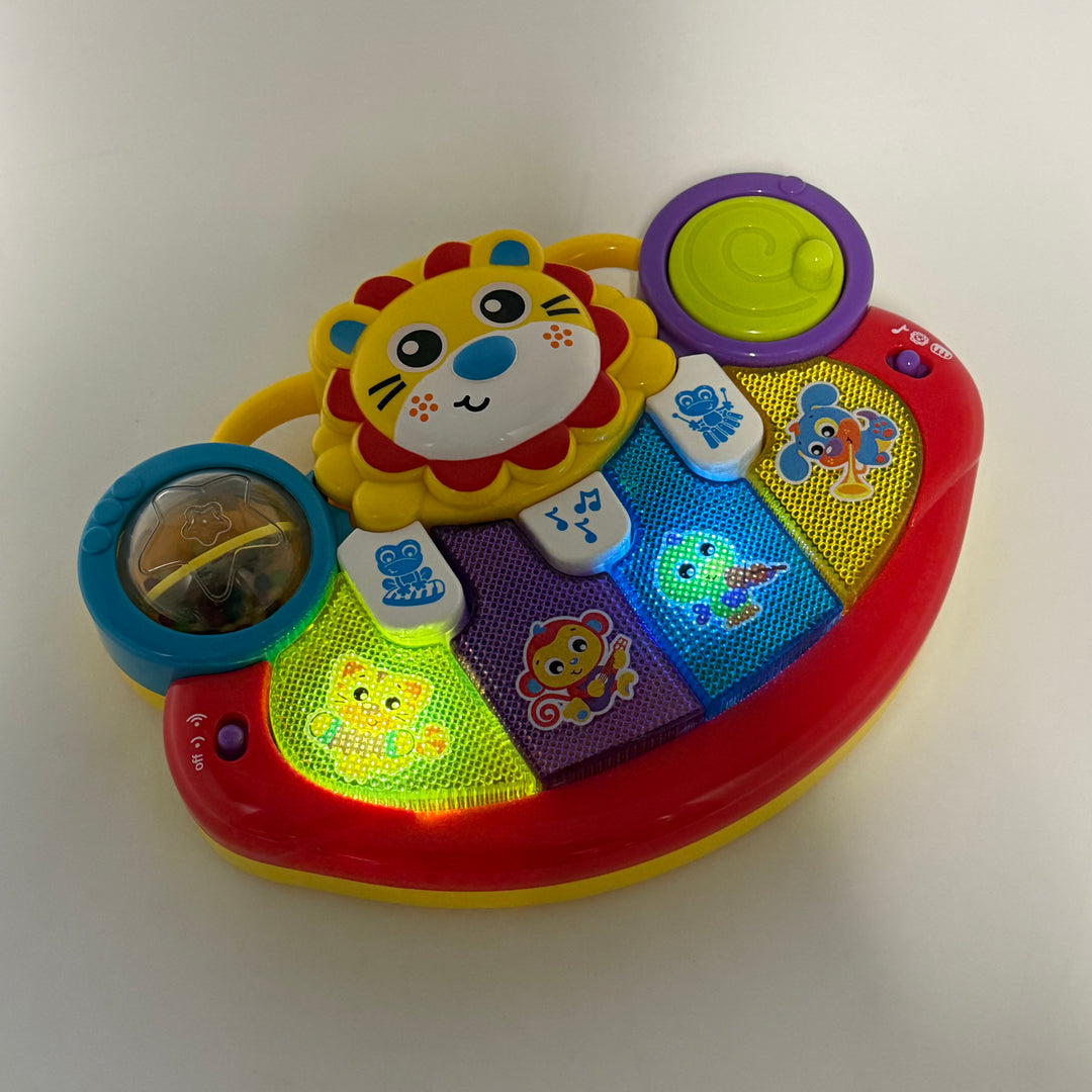 Charmigt elektroniskt lejonspelbord för barn