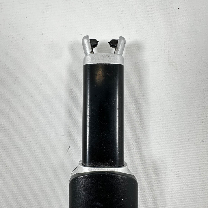 Elegant svart bågeldare från Jula AB