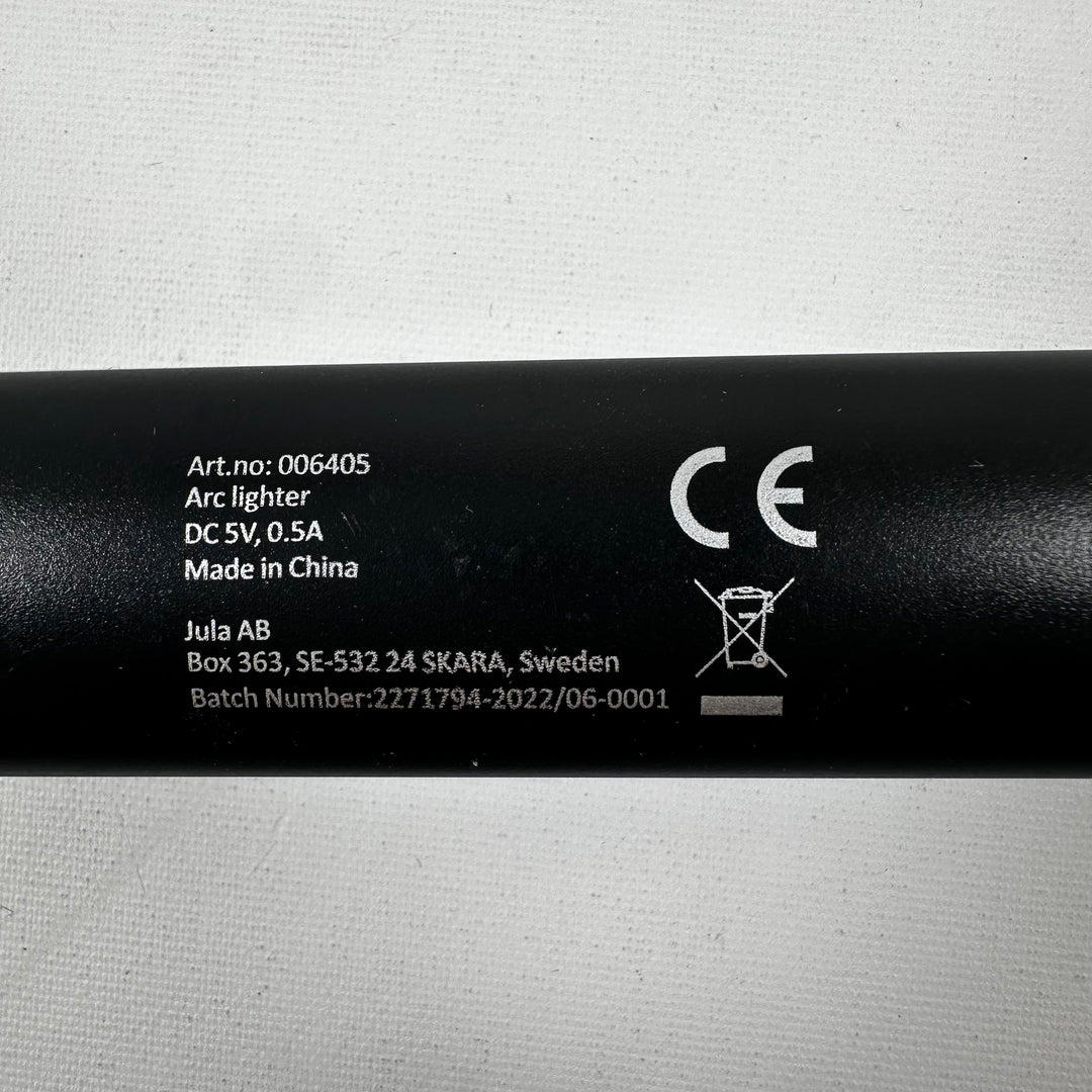 Elegant svart bågeldare från Jula AB