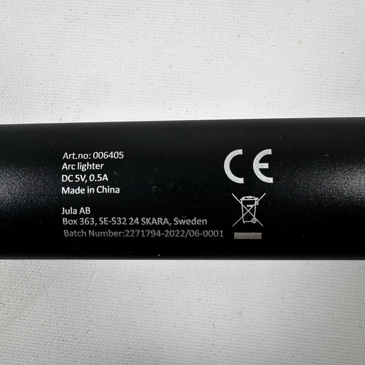 Elegant svart bågeldare från Jula AB