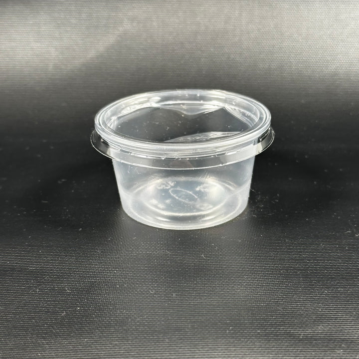 Abena transparent plastbehållare med lock 100 ml