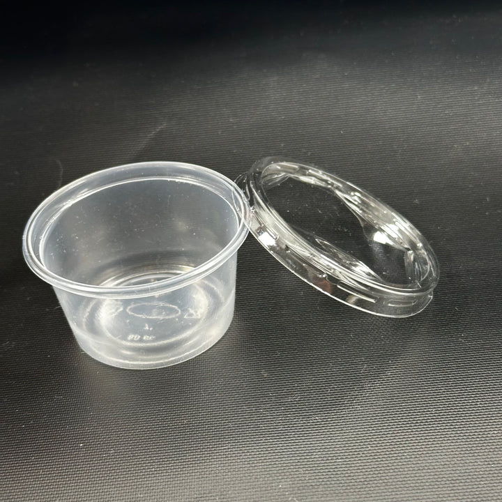 Abena transparent plastbehållare med lock 100 ml