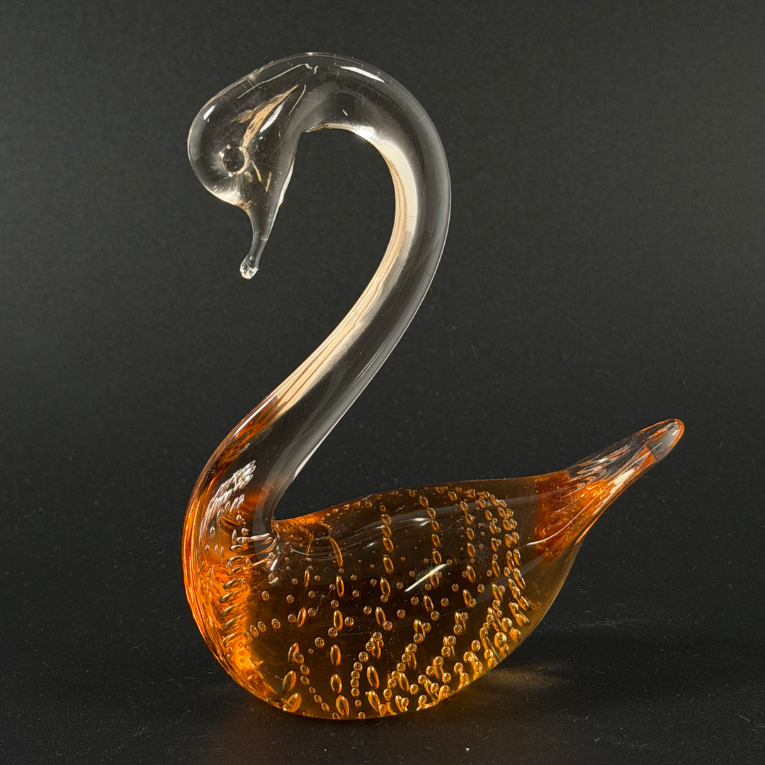 Retro munblåst glas-svan i bärnsten